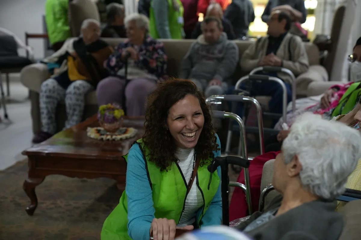 student working with elderly