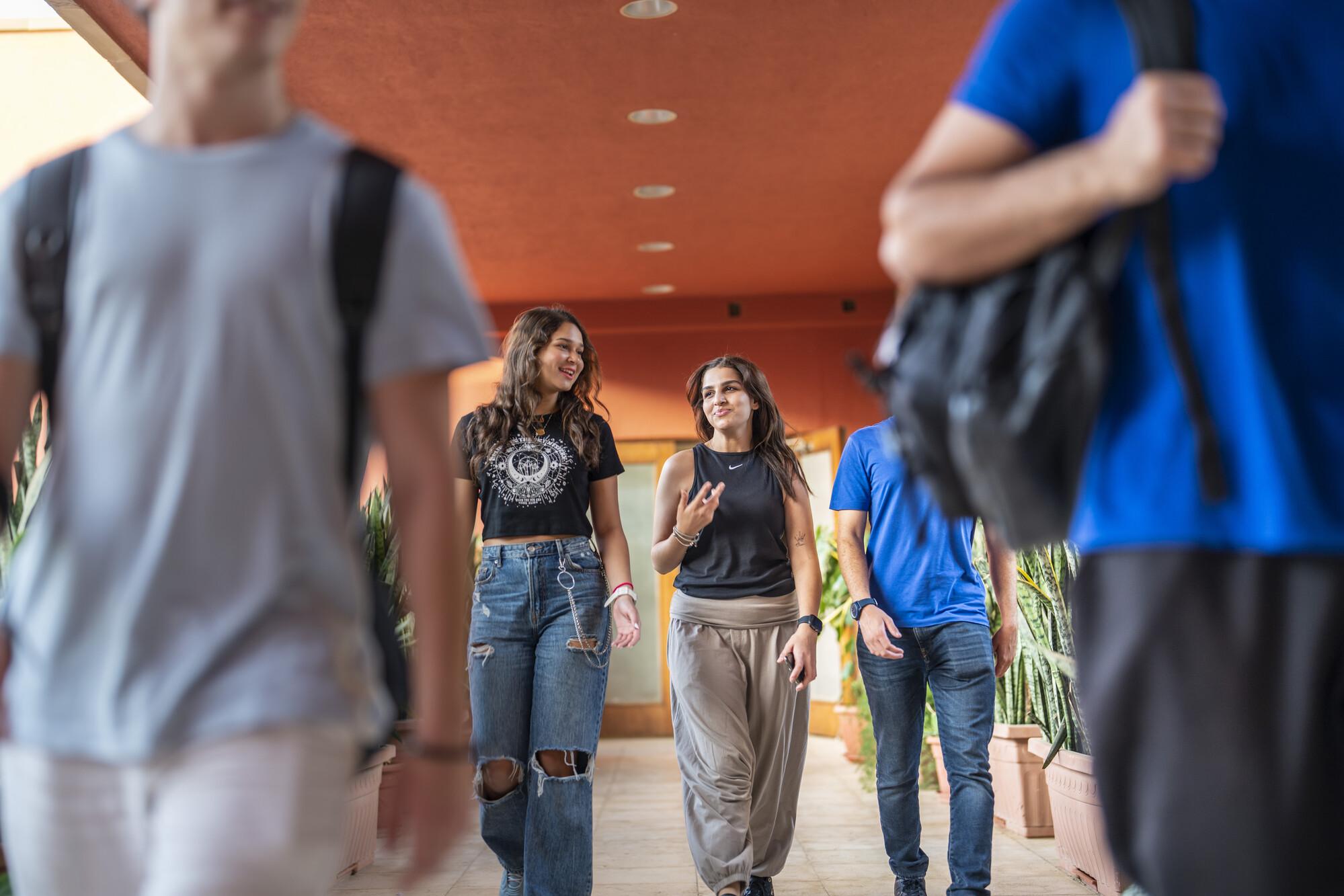 students walking on campus