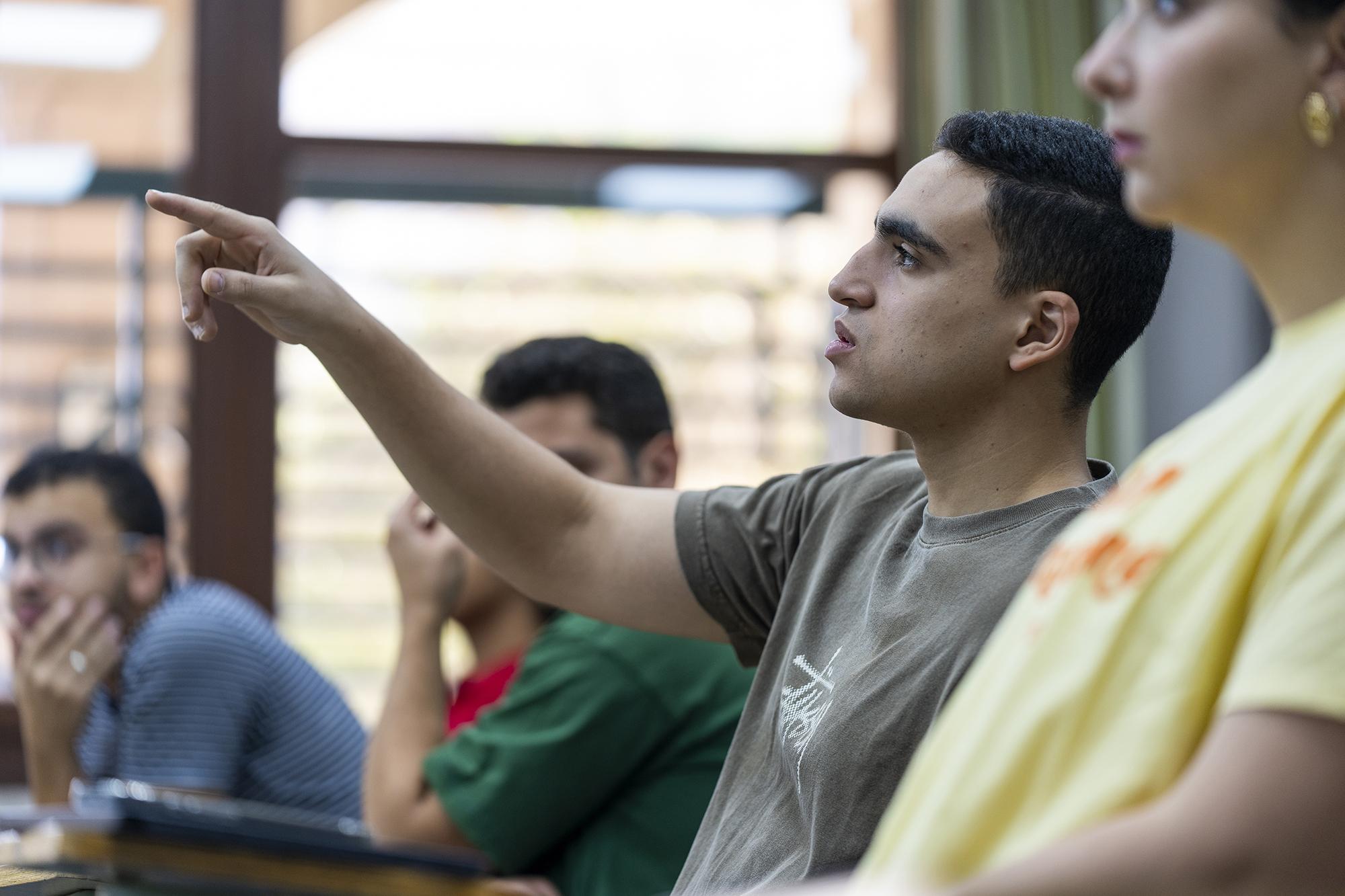 students asking questions in classroom