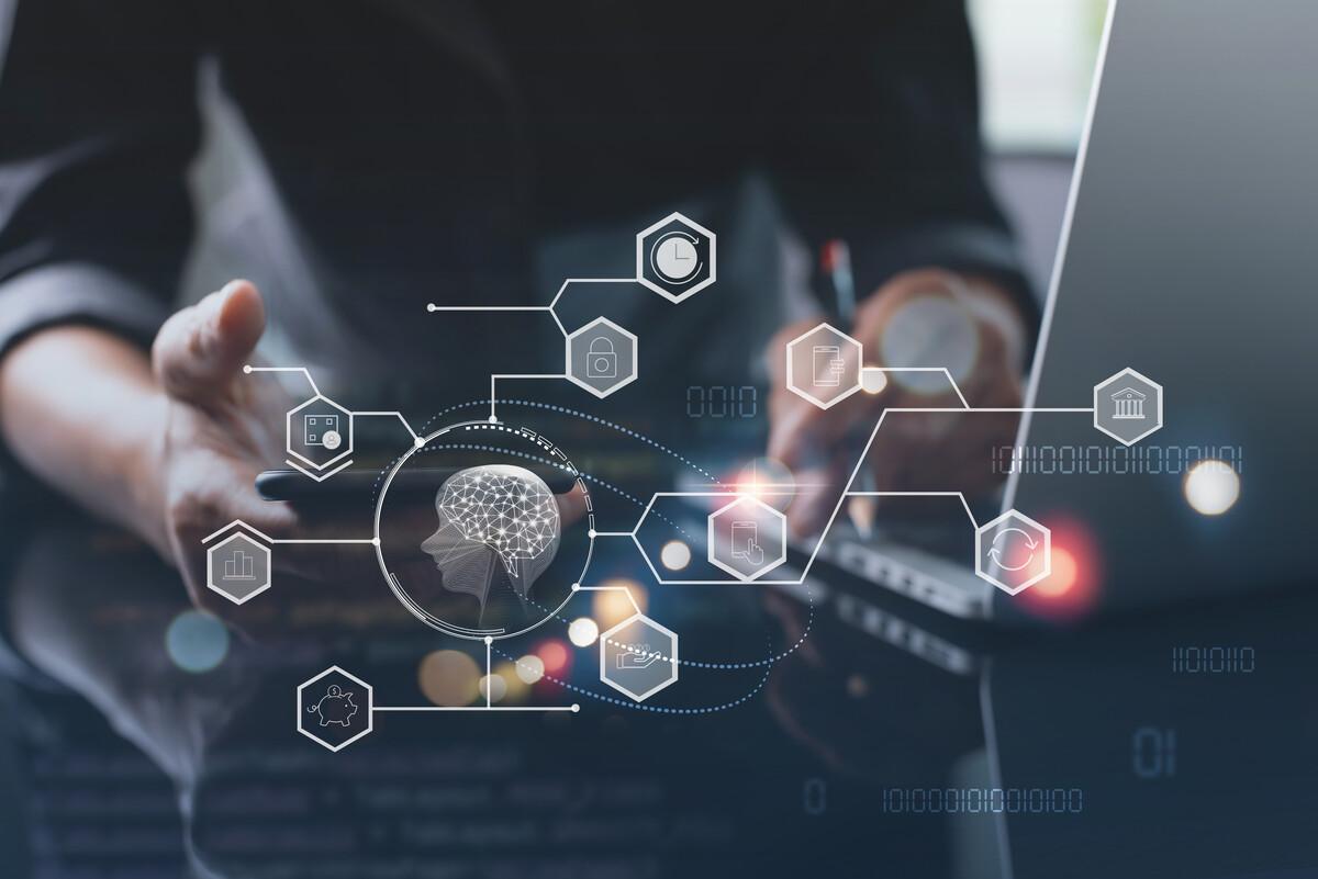 graphics and laptop showing technology and ai 