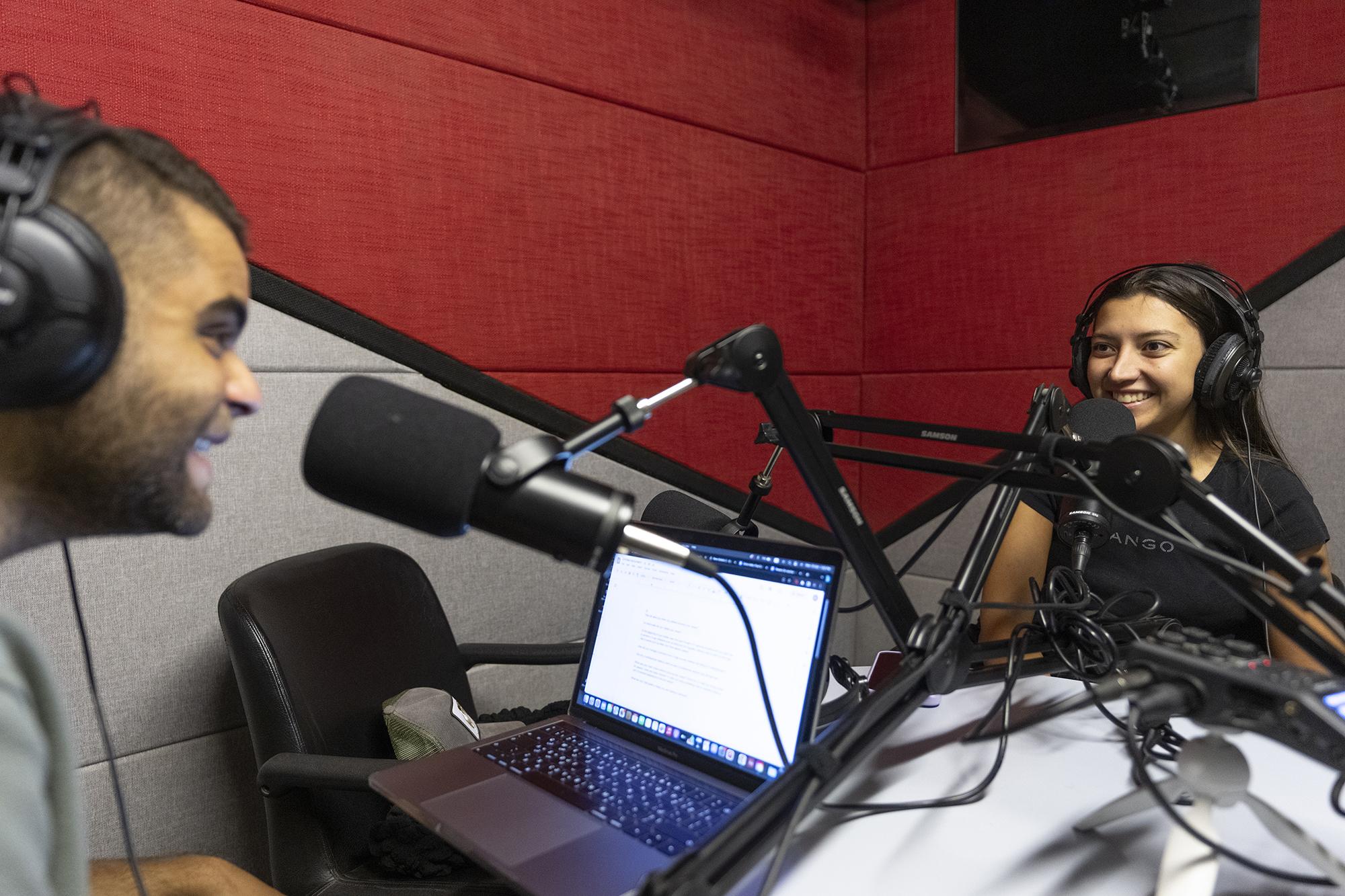 students working on podcast in studio