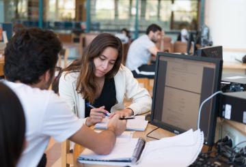 students studying in the library