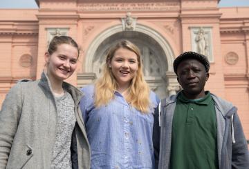 students standing in front on the egyptian museum