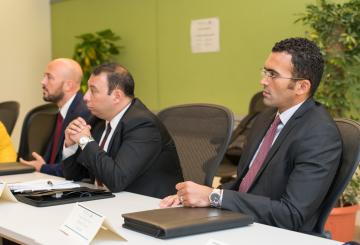 3 men on a panel discssion
