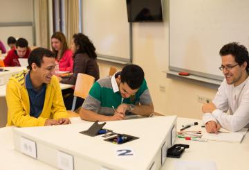 students working in classroom on project