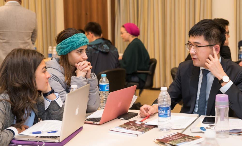 AUC students working in workshop with international students