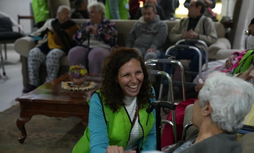 student working with elderly