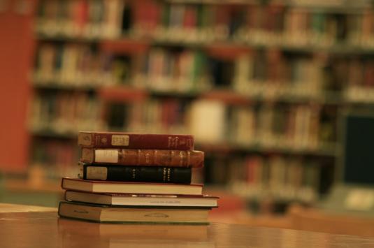 Books on a desk at AUC's Rare Books and Special Collections Library