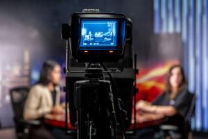 image of camera shooting in the newsroom studio