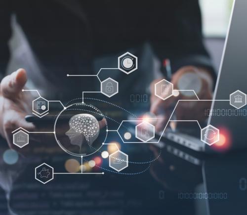 graphics and laptop showing technology and ai 