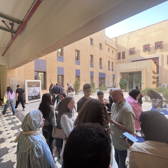People talking together in an outdoor area